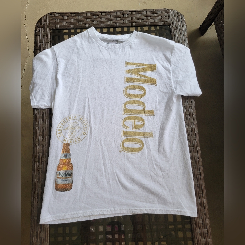 ModelCo White Tee with Gold Logo and Bottle Graphic